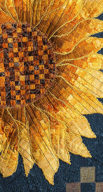 partial sunflower showing the free motion zigzag stitch on petals