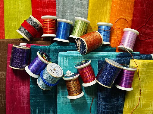 Colourful fabrics and threads