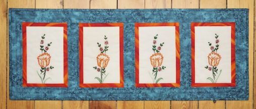4 tulips on white backgrounds framed in orange and teal