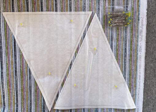 triangles pinned to fabric