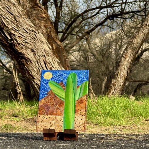 Saguaro postcard in from of a tree